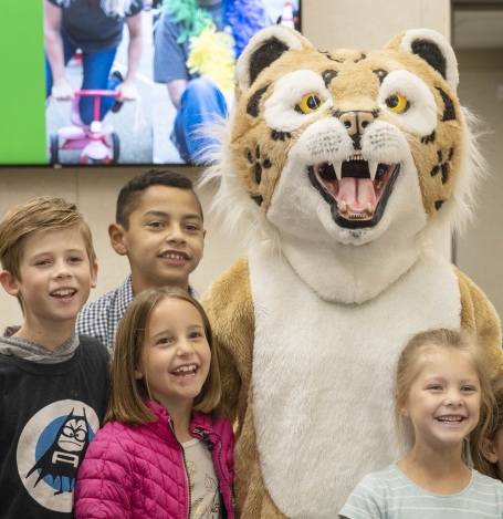 Tiger mascot with kids
